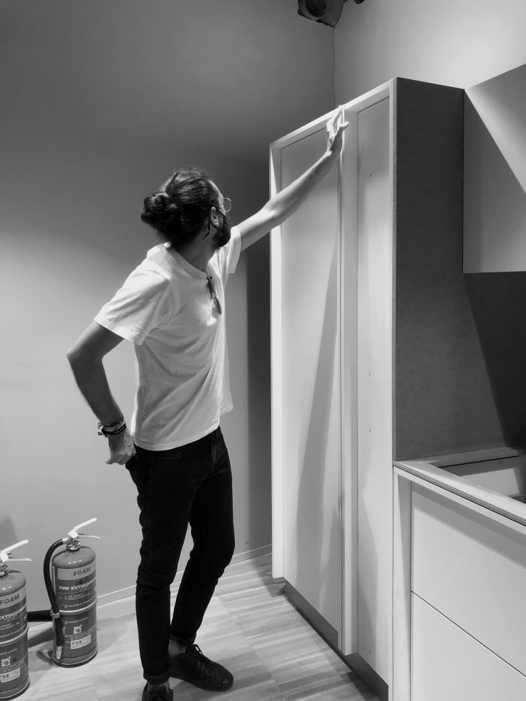 Jean Ebejer, architect at Valentino Architects, checking the dell kitchen prototype