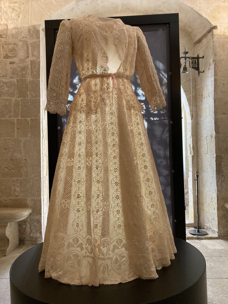 A dress made entirely of Maltese lace from the Casa Rocca Piccola Collection.