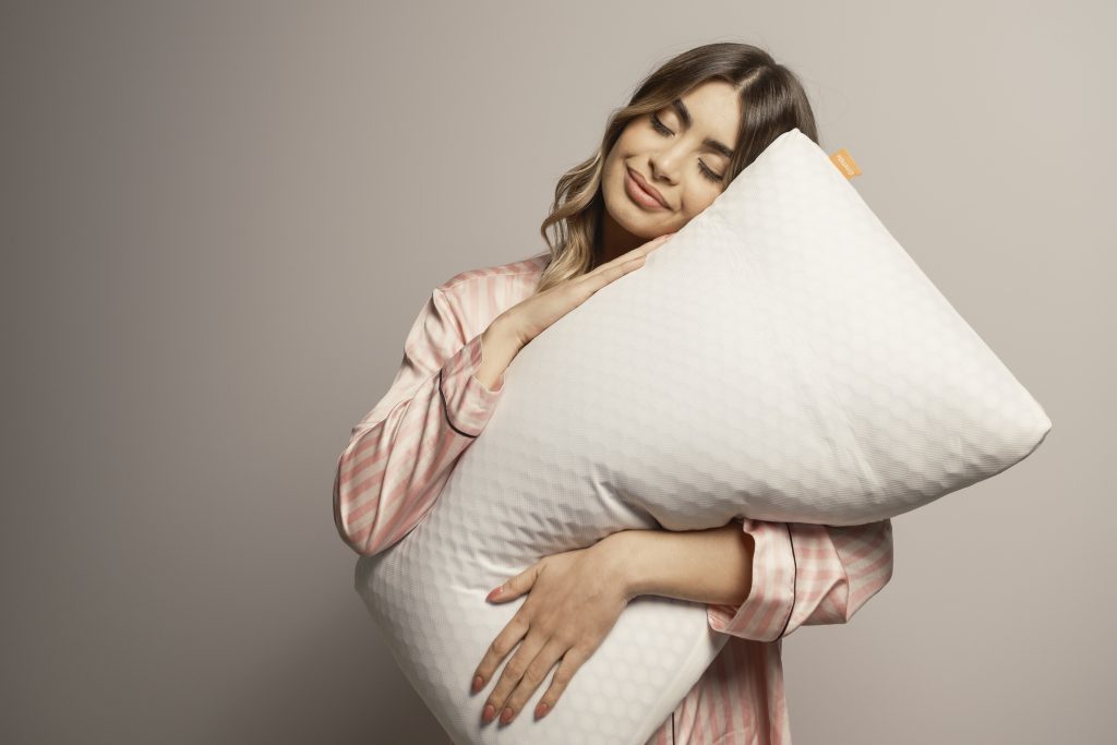 Emma Muscat holding Emma pillow of Form Ltd