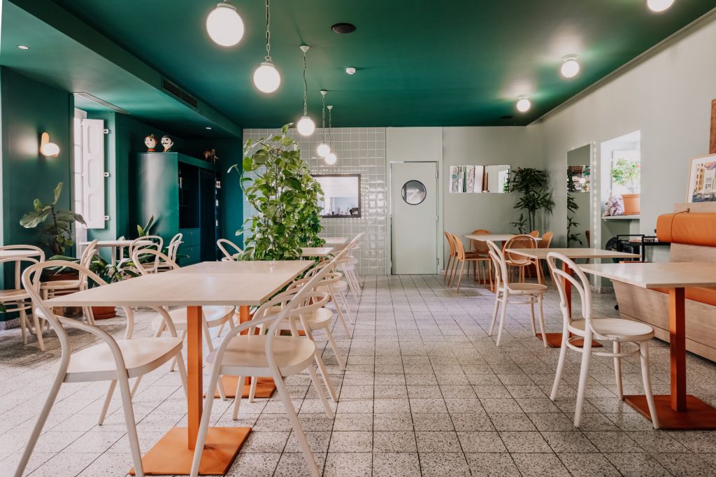 Elephant Shoe cafe restaurant interior styling with greenery
