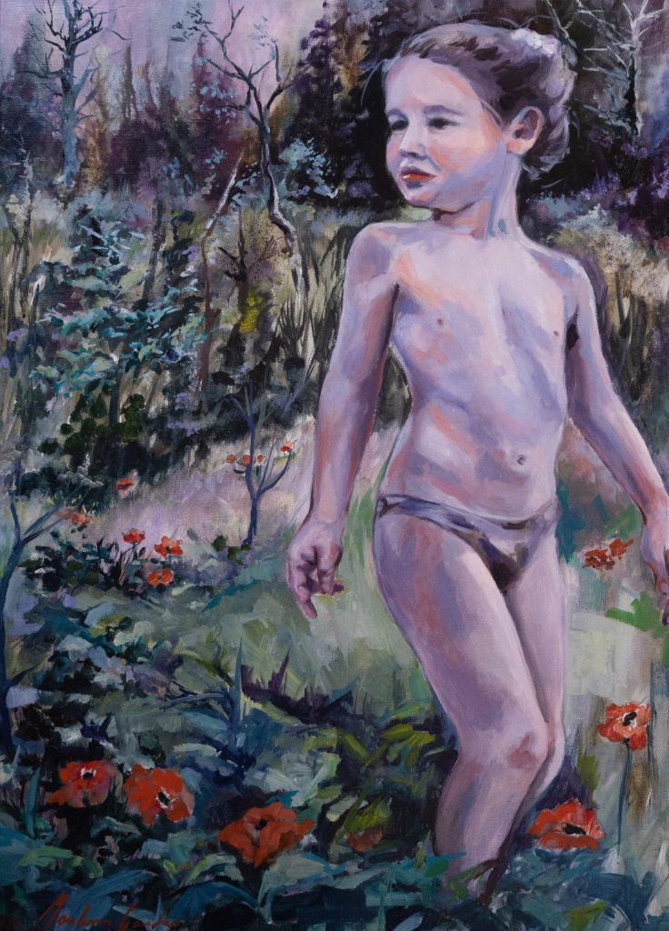 young girl running in a field