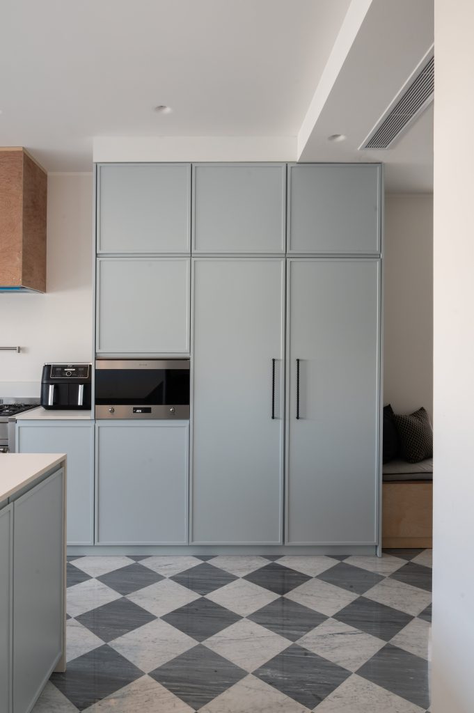 minimalist blue kitchen checkered tiles