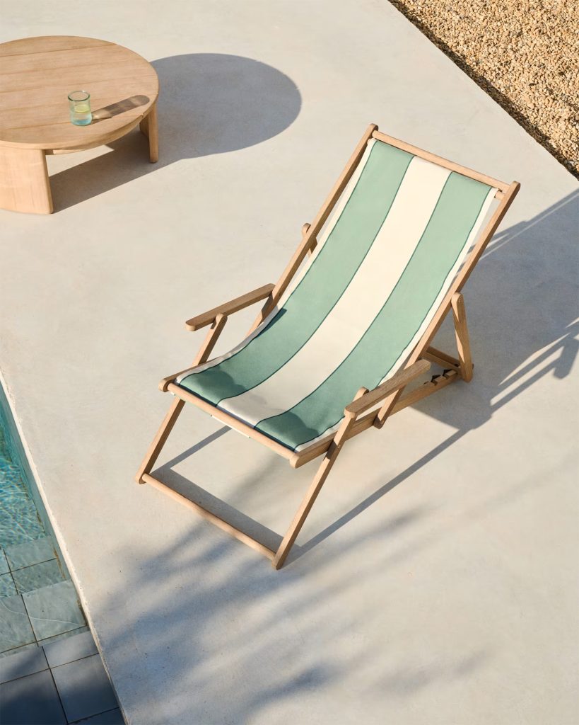 striped deckchair by the pool