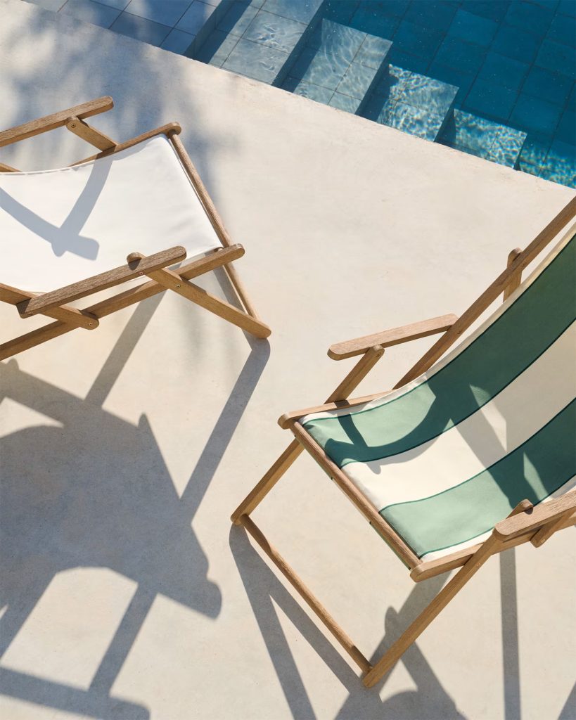 striped deckchairs by the pool