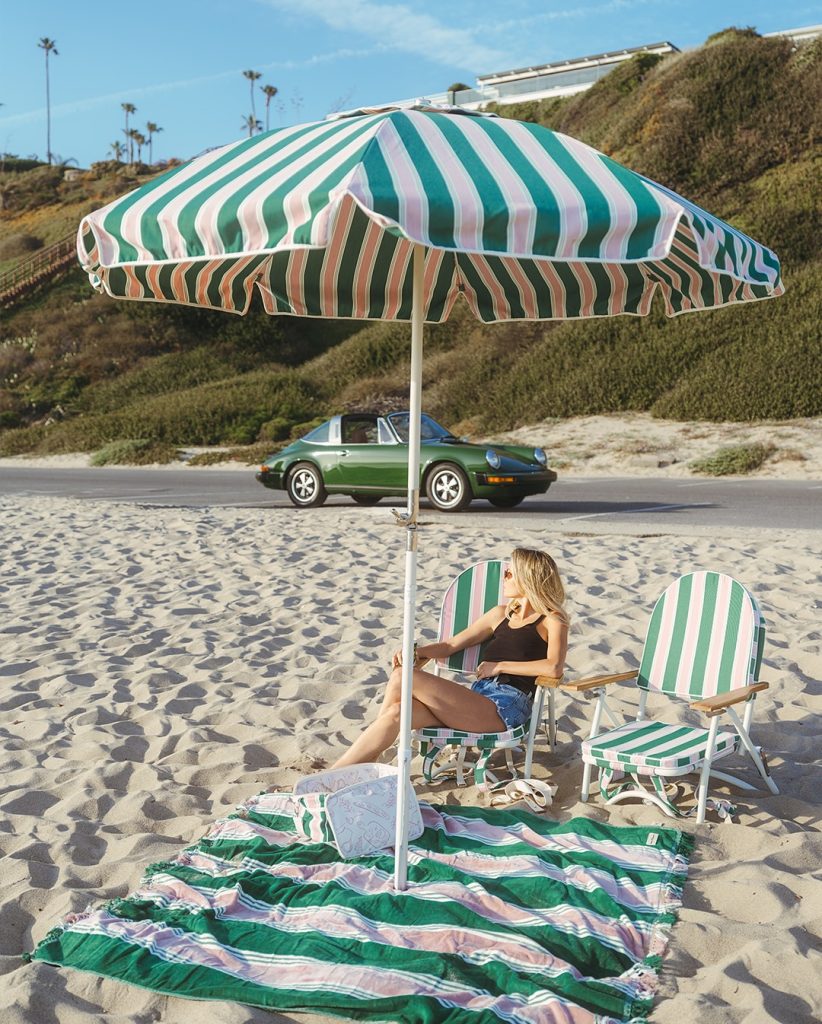 retro striped umbrella and deckchair