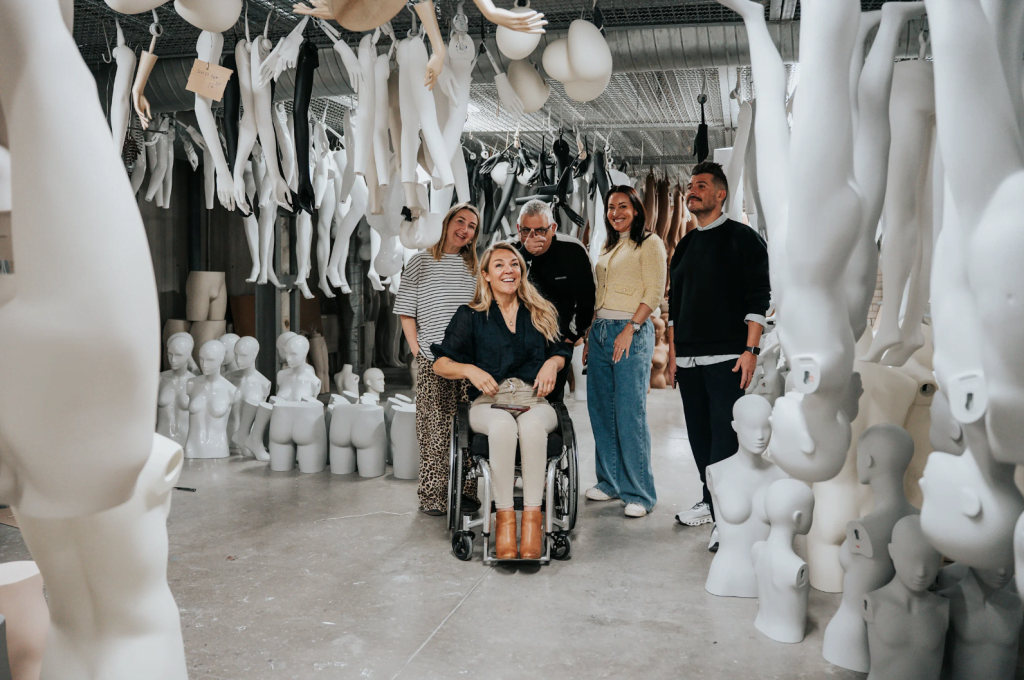 Sophie Morgan next to wheelchair seated mannequin she desgned with Primark