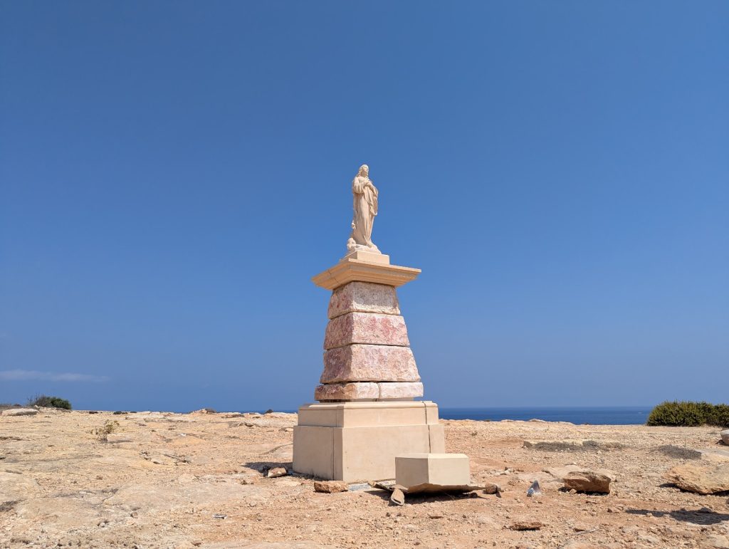 L-Ahrax statue and pedestal prior to its restoration